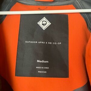 Outdoor Afro x REI Co-op Orange Jacket